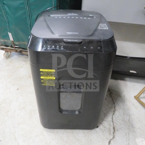 Amazon Basics paper shredder on casters, model B07NXJT6NN, 120V, black, good condition, visible control labels.