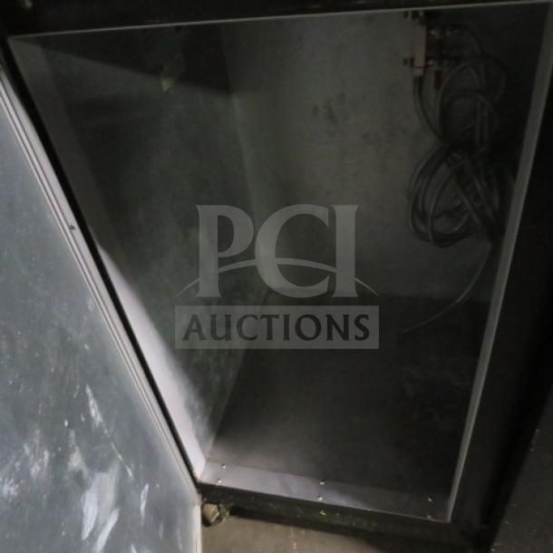 Beverage Air DD48Y-1-B kegorator interior view, showing spacious compartment with wiring. 2-door model on casters, 115 Volt.