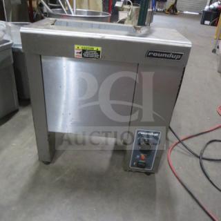 Roundup VCT-1000CF conveyor toaster, stainless steel, 120V, with control panel and caution label, used condition.