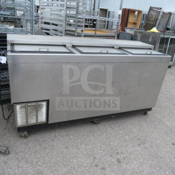 Glastender 3 Door Bottle Box on Casters, Model ST72-SF, 72x24x38 inches, stainless steel, used condition, 115 Volt.