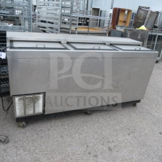 Glastender 3 Door Bottle Box on Casters, Model ST72-SF, 72x24x38 inches, stainless steel, used condition, 115 Volt.