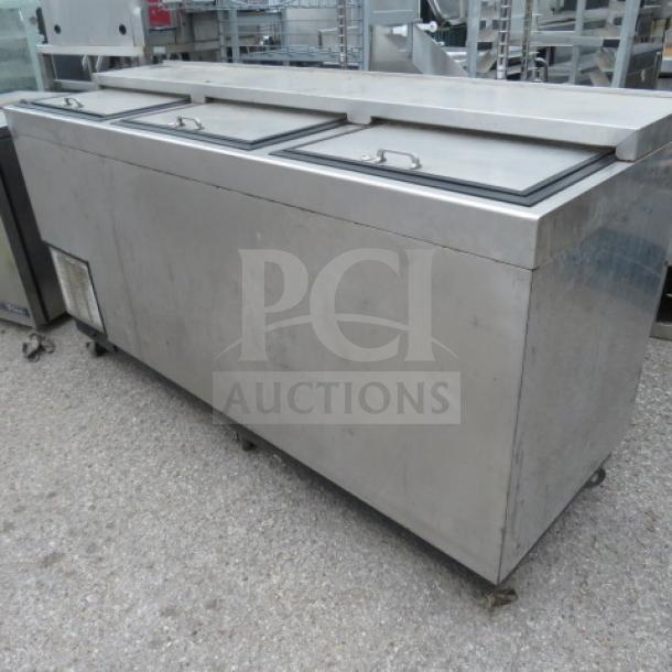 Glastender 3-door bottle box on casters, Model ST72-SF, 115V, stainless steel, 72x24x38 inches, used condition.