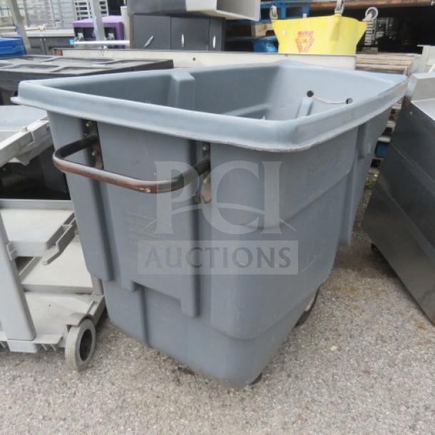 Rubbermaid hand truck, large gray bin with metal handles, visible damage at bottom. Suitable for repairs or parts.