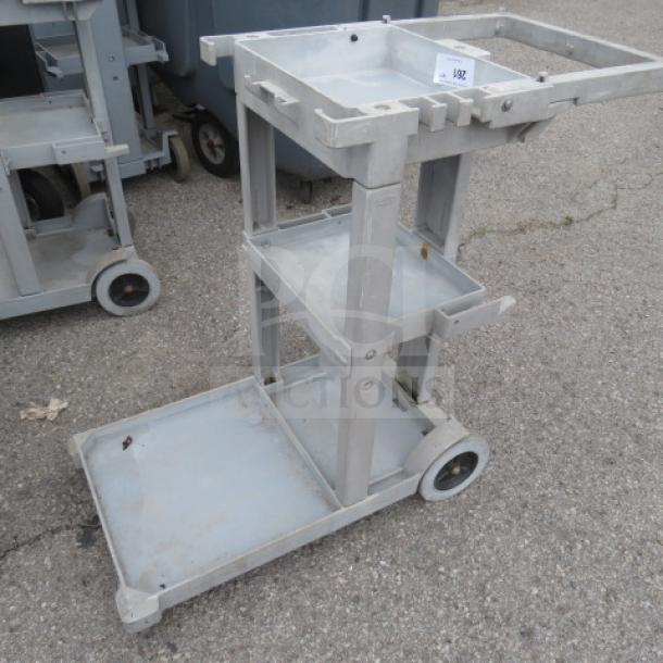 Rubbermaid Janitor Cart on casters, model 6152-02. Durable, multi-shelf design. Used condition, priced at $390.00.