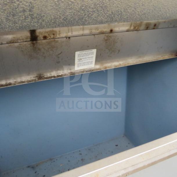 Cornelius Ice Bin, Model B842P, 42x32x45, metal exterior, some rust, blue interior, visible label with specs.