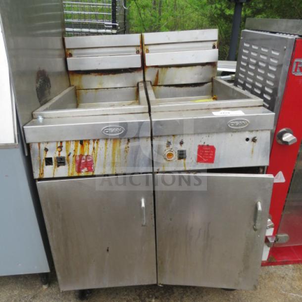 Dean Dual Natural Gas Deep Fryer, on casters, dimensions 32.5x33x45 inches. Features dual compartments with visible wear.