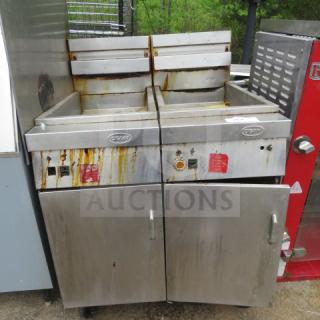 Dean Dual Natural Gas Deep Fryer, on casters, dimensions 32.5x33x45 inches. Features dual compartments with visible wear.