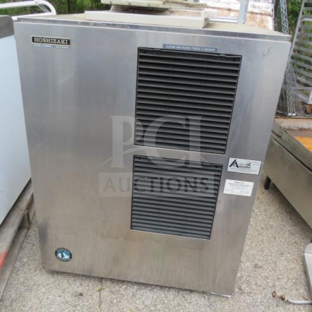 Hoshizaki ice maker, model KM-800MAE, 208-230 volt, 1 phase, 30x28x38 inches, stainless steel, visible labels.