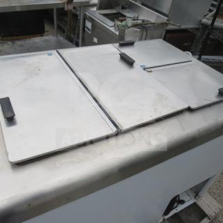 Nelson BD-6 dipping cabinet, stainless steel; 115V, 43.5"x30.5"x32.5". Used condition with visible marks.