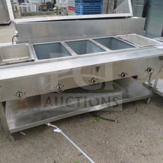 Industrial electric steam table with five wells, under shelf, stainless steel, 72x30x34 inches, used condition.