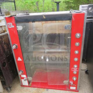 Rotisol rotisserie, model 38X20X45, red and steel, glass doors, control knobs on side, used condition.
