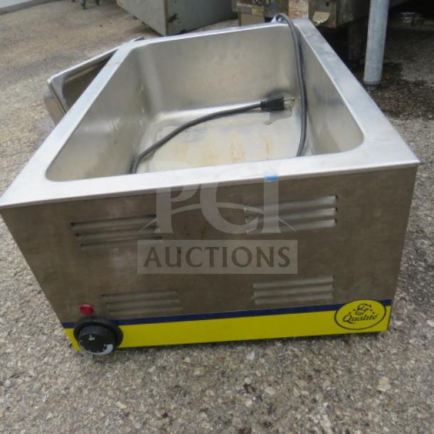 Adcraft FW-1200WF food warmer, stainless steel, 120V, 1200W, visible power cord, minor wear, quality assurance label.