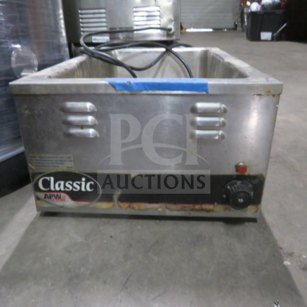 APW WYOTT W-3V food warmer, 120V, 1200W, stainless steel, visible wear, temperature dial, Classic APW logo on the front.