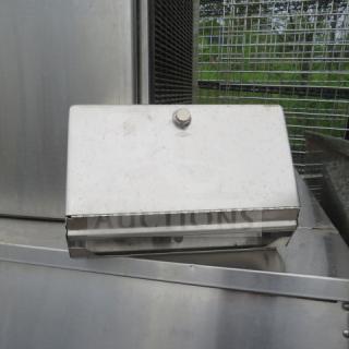 Bobrick stainless steel wall mount towel dispenser, used condition, visible mounting hardware, suitable for commercial use.