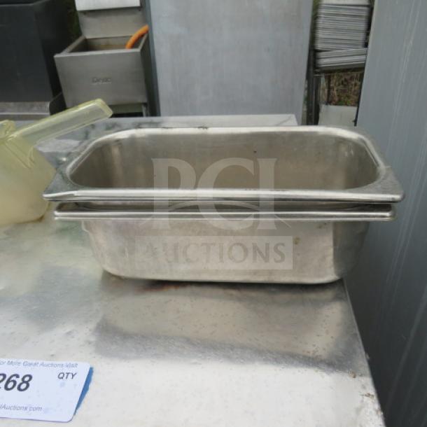 1/3 size, 4-inch deep stainless steel hotel pan, used condition, visible stacking design, label indicates lot 268.