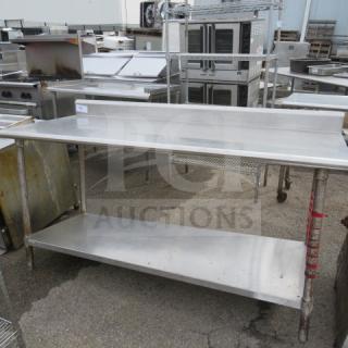 Stainless steel table with backsplash, under shelf, 72x30x38, in used condition, ideal for commercial kitchens.