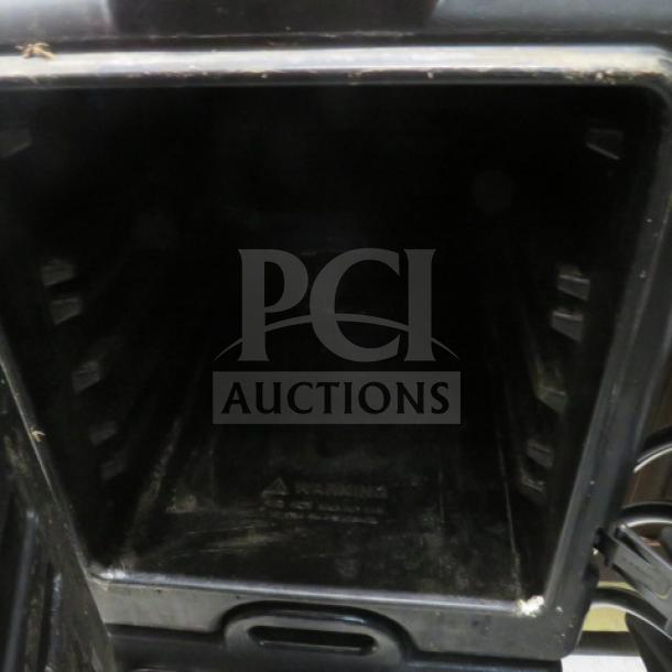 Cambro Ultra Pan Carrier UPC300, used condition, open interior view, black color, durable transport solution for catering.