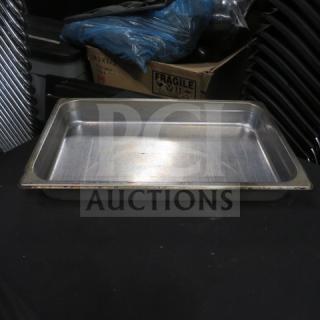Full-size stainless steel 2.5-inch deep hotel pan in good condition, no visible marks; ideal for catering or buffet use.