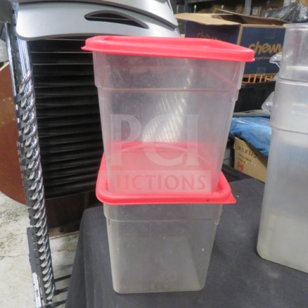 8-quart food storage container with red lid, clear plastic, gently used. Stacked design, ideal for kitchen organization.