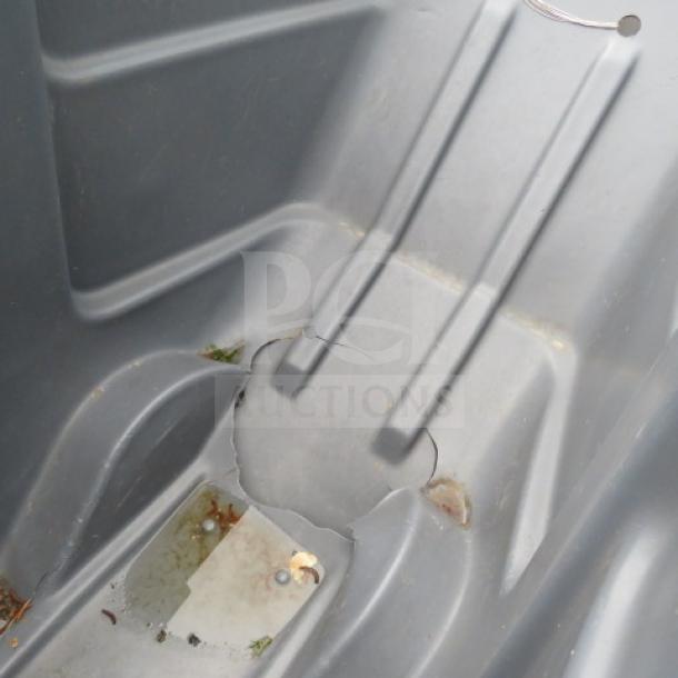 Rubbermaid hand truck with significant crack at the bottom, visible wear. Ideal for parts or repair.