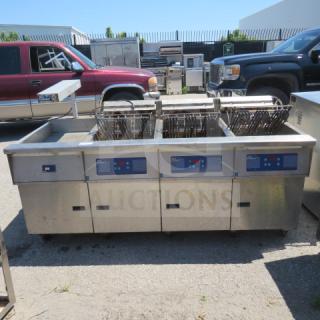 One Pitco 3 Bay Electric Fryer With Warming Station With A Hatco Warmer, GRFSC-24, On Casters. #FE18S-CQV. 208 Volt. 3 Phase. 81X38X40. $39,226.00