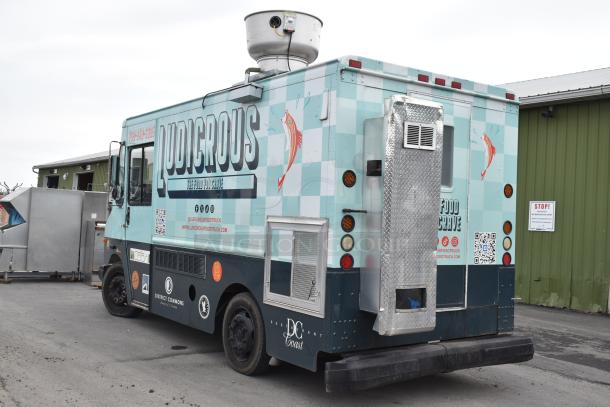 2002 Freightliner MT45 food truck with Ludicrous wrap, 18' length, propane hookup, grease hood, fryers, griddle, grill, refrigeration, serving window.