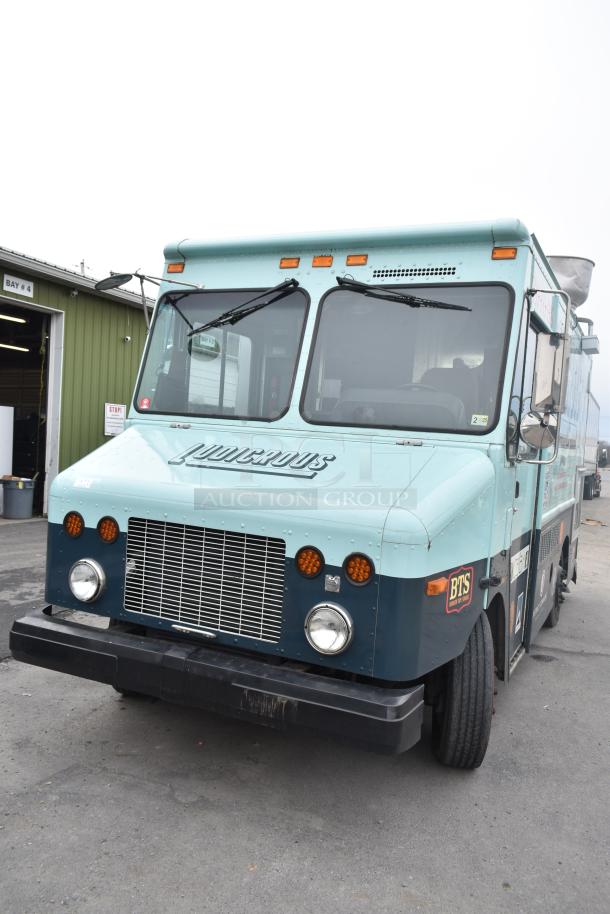 2002 Freightliner MT45 food truck with "Ludicrous" wrap, equipped with propane hookup, grease hood, fryer, griddle, grill, refrigeration, and serving window.