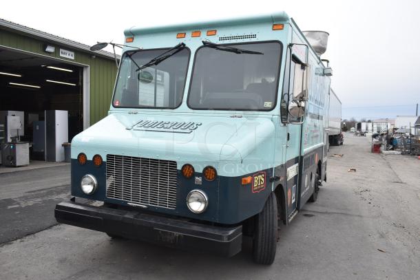2002 Freightliner MT45 food truck with Ludicrous wrap, propane hookup, grease hood, fryer, griddle, grill, and serving window.