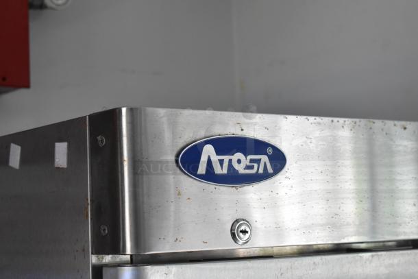 Close-up of an Atosa appliance inside a 2002 Freightliner MT45 food truck. Stainless steel with visible logo and screws.