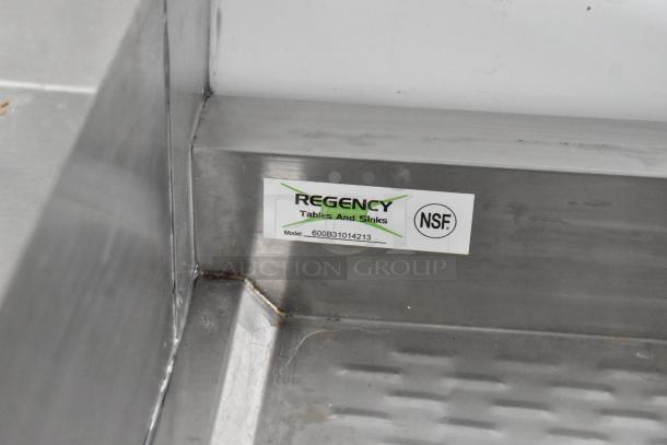 Regency stainless steel corner with NSF label for food safety, model 600B31014213, in food truck.