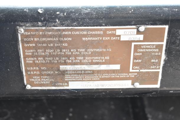 Freightliner MT45 identification plate showing vehicle specs, including GVWR 14,140 lb, dimensions, and tire details.