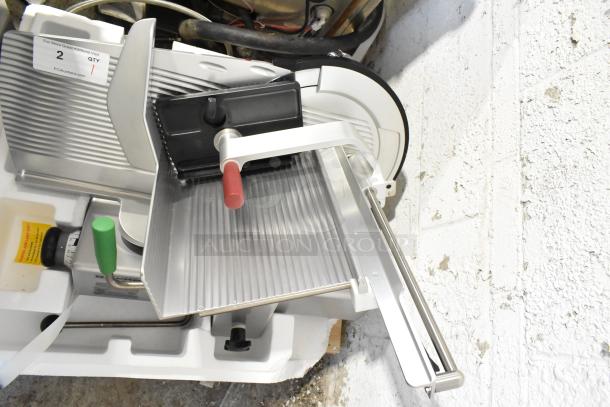 2023 Bizerba GSP HD commercial meat slicer, excellent condition, 120 volts, visible blade guard, and control knobs.