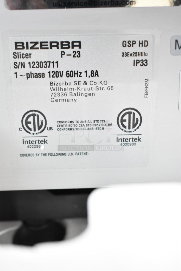 2023 Bizerba GSP HD commercial meat slicer label, showing model, serial number, 120V 1-phase, ETL certifications.