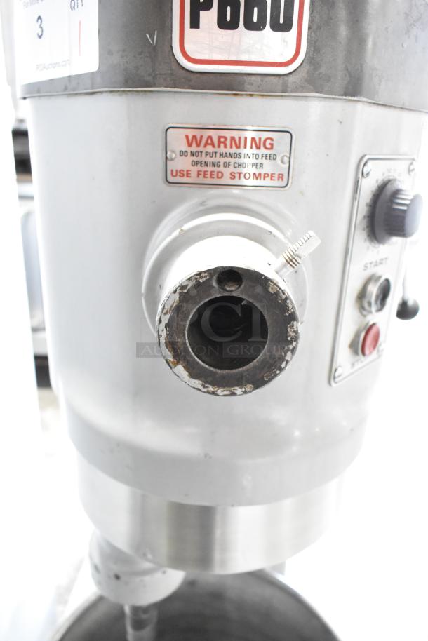 Hobart P660 60-quart dough mixer with metal bowl and dough hook, 240V, visible warning label, commercial use.