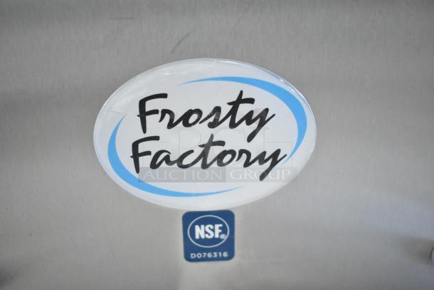 Brand new Frosty Factory 217W commercial frozen cocktail machine, scratch and dent, NSF certified label visible.