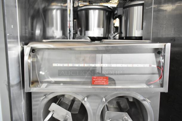 Brand new 2026 Frosty Factory 217W commercial frozen cocktail machine, 16 Qt. double cylinder, water-cooled, 115V, 1 phase.