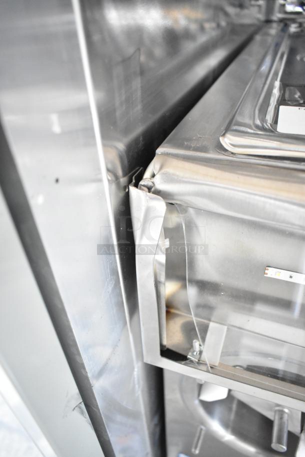 New Frosty Factory 217W commercial frozen cocktail machine; 16 Qt, double cylinder, scratch and dent, 115V, water-cooled.