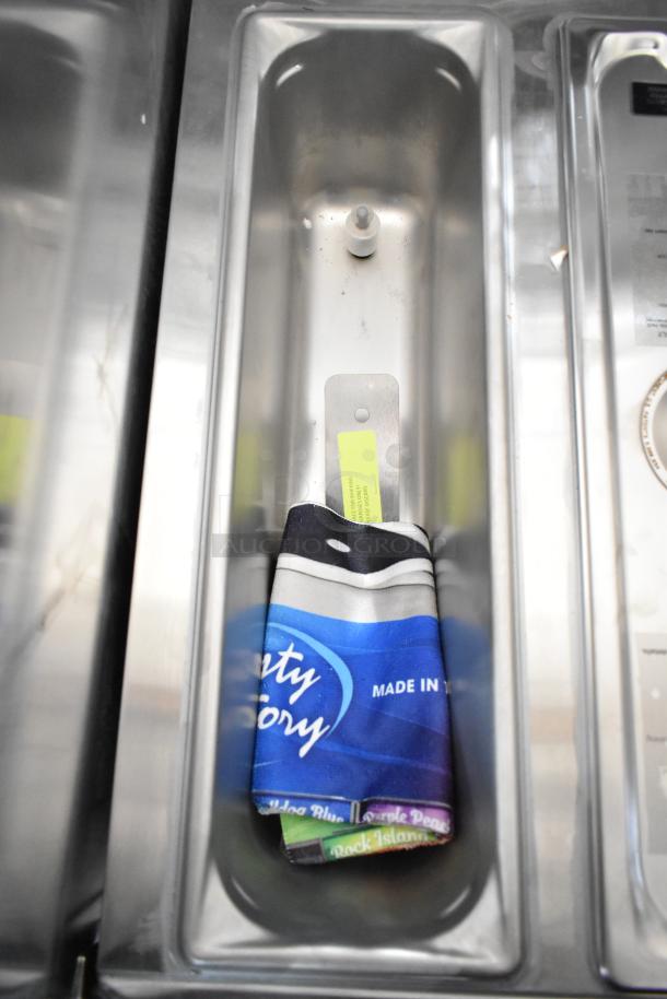 Brand new Frosty Factory 217W commercial frozen cocktail machine. Water-cooled, 16 Qt capacity, visible model label.