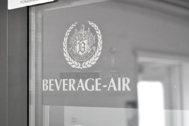 Beverage Air MT23-1 B 18 glass door merchandiser, black, left-hinged, LED lighting, new scratch and dent condition.