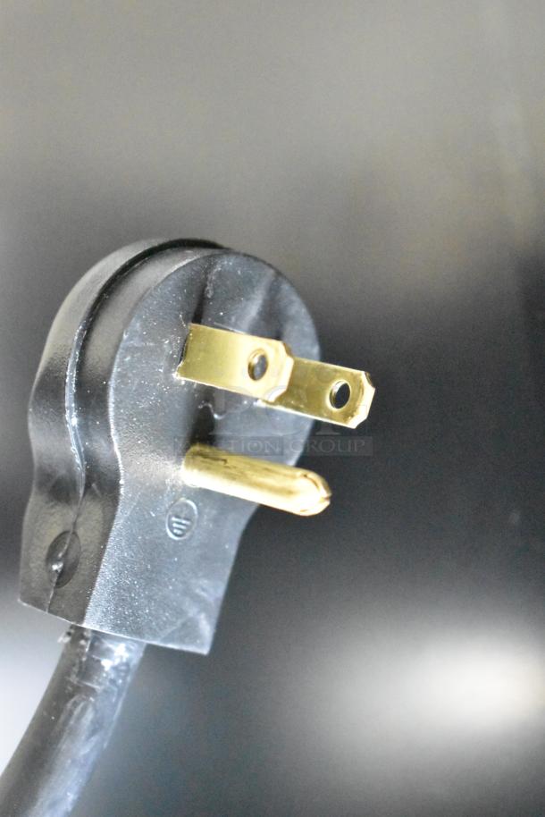 Close-up image of the plug for a Beverage Air MT23-1 B 18 refrigerated merchandiser. Brand new condition.