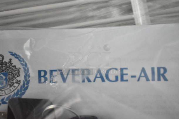 Beverage Air MT23-1 B 18 commercial glass door merchandiser with branding visible. Brand new, scratch and dent condition.