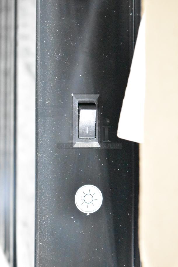 Beverage Air MT23-1 B 18 commercial merchandiser detail showing switch and light control on black panel.