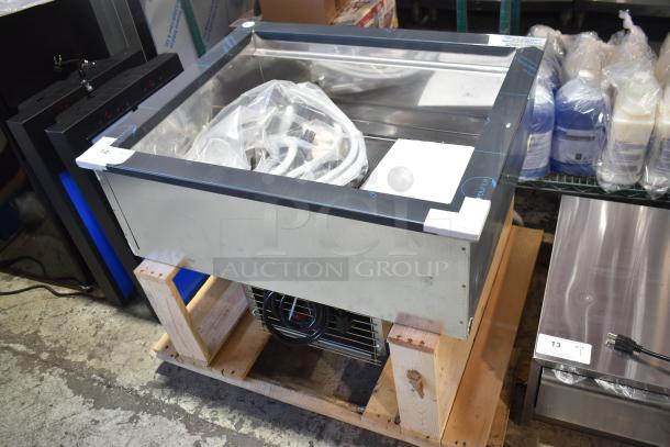 Brand new 2024 Delfield N8130BP drop-in refrigerated cold food well, 120V, 1 Phase, on a pallet. Scratch and dent condition.