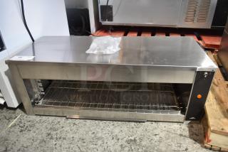 Brand new Vollrath JW30PA 35" countertop cheese melter, plate activated, 240V, 1 phase, with scratch and dent.