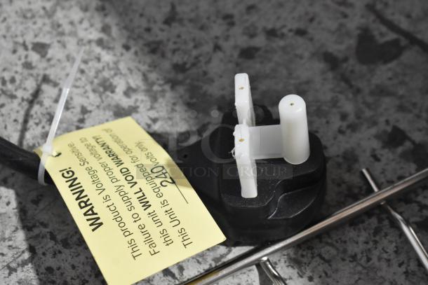 BRAND NEW Vollrath JW30PA Cheese Melter plug with warning tag, specifies 240 volts operation.