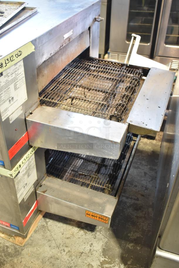 Middleby Marshall CTX DZ33T stainless steel conveyor pizza ovens on casters, tested and working, label visible.