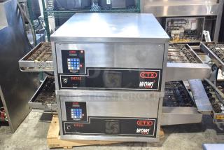 2 2021 Middleby Marshall CTX DZ33I Stainless Steel Commercial Electric Powered Conveyor Pizza Ovens on Commercial Casters. 208 Volts, 3/1 Phase. 2 Times Your Bid! Tested and Working!