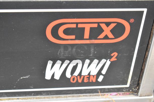 Middleby Marshall CTX DZ33I commercial pizza oven image, showing "WOW! Oven" branding on stainless steel.