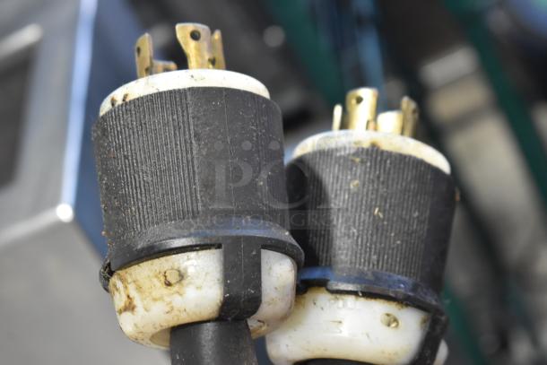 Close-up of electrical plugs for Middleby Marshall CTX DZ33I conveyor pizza ovens, showing wear and dirt, 208 volts, 3/1 phase.