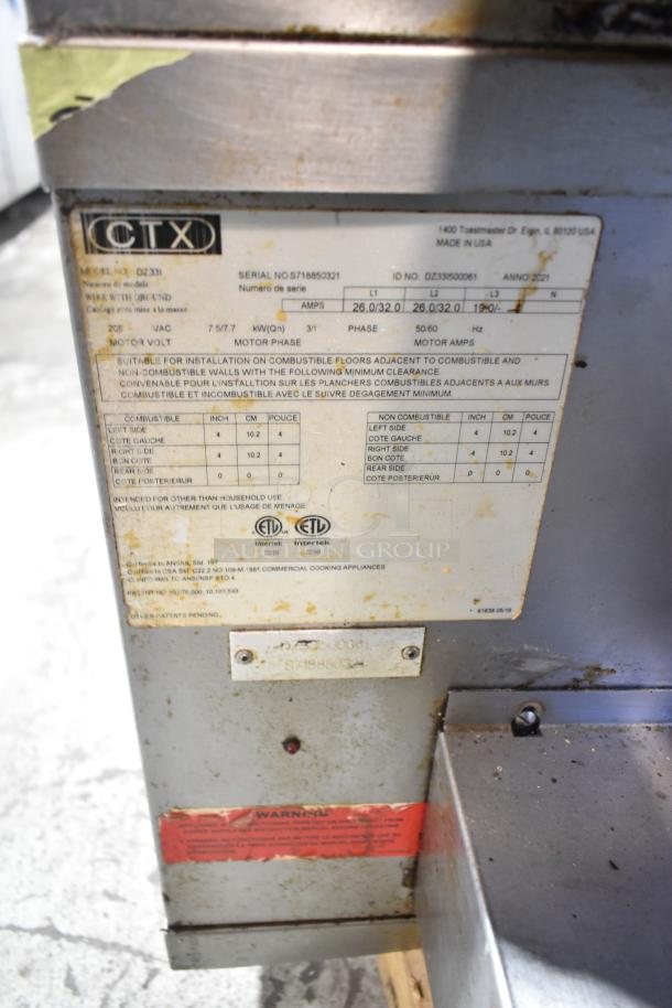 2021 Middleby Marshall CTX DZ33I stainless steel conveyor pizza oven. Model details and safety tags visible.